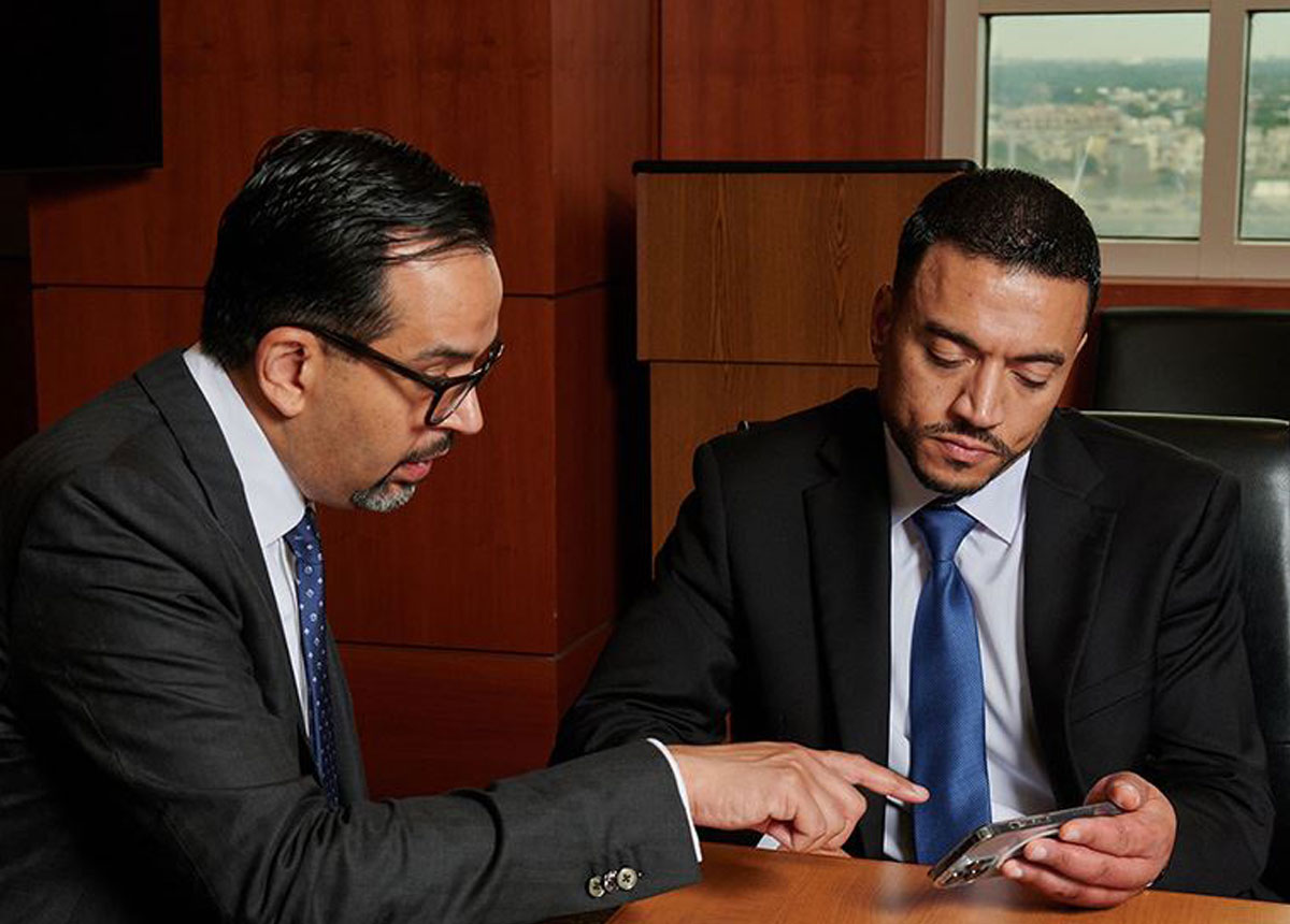 omar-mustafa-attorney-omar-law-firm Attorneys Omar Khawaja and Mustafa Latif working on a client's case